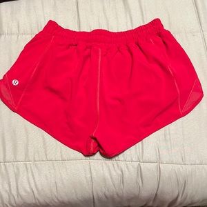 Red Lululemon shorts